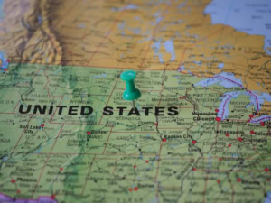 A pin marks the U.S. Upper Midwest region on a map.